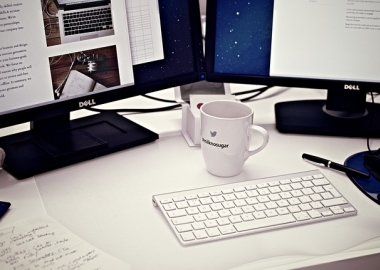 Desk with computer, coffee mug