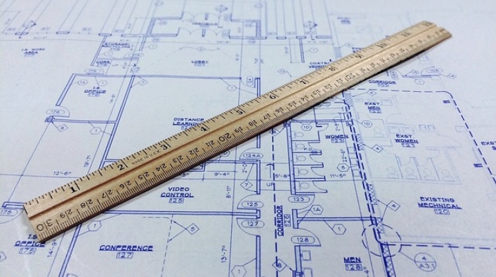 Blueprint with ruler on top of it