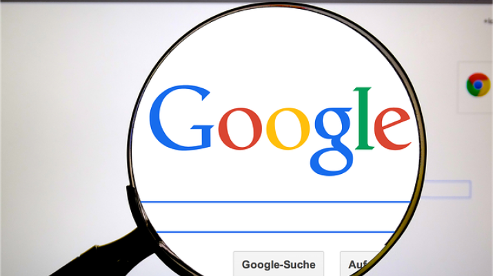 Magnifying glass over the Google logo