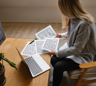 woman sitting with wireframes