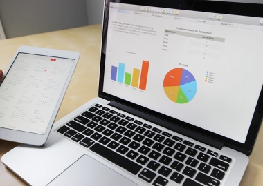 Latpop with graphs and charts on screen