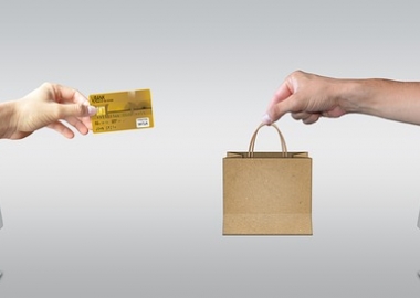 Two computers with pad lock and credit card