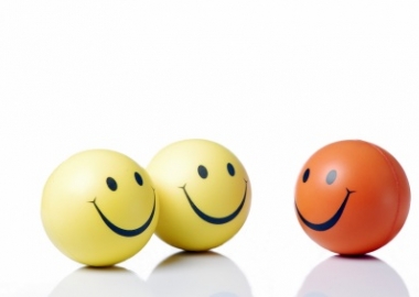 Three smiley face cartoons