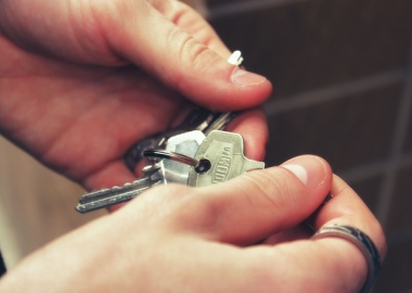 Hands holding keys