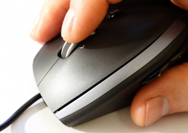 Hand on a computer mouse