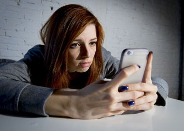 Woman looking at smart phone