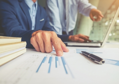 Business owner checking numbers