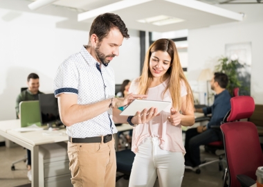 coworkers with tablet