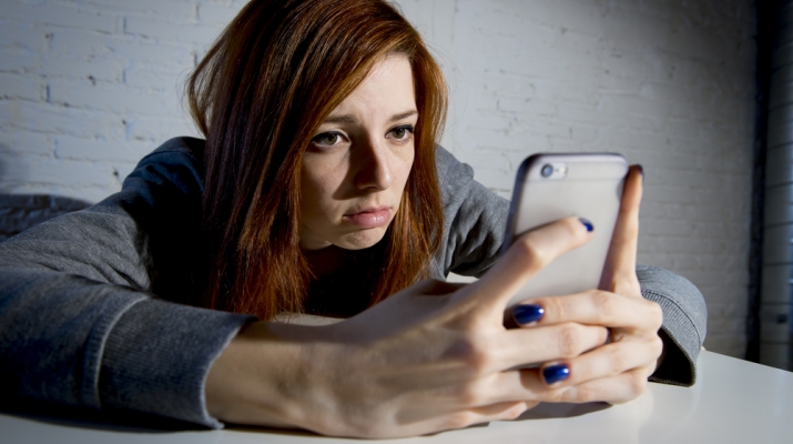 Woman looking at smart phone