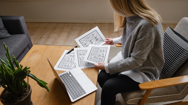 woman sitting with wireframes