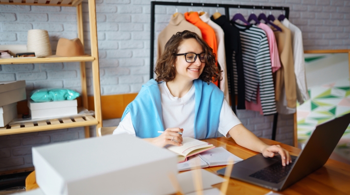 clothing business owner at desk