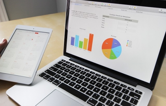Latpop with graphs and charts on screen