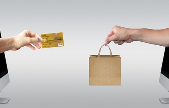 Two computers with pad lock and credit card