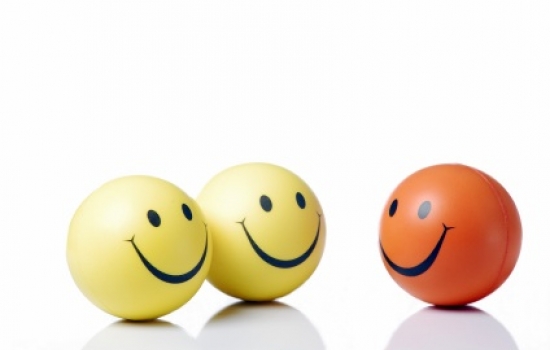 Three smiley face cartoons