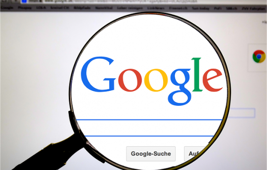 Magnifying glass over the Google logo