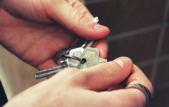 Hands holding keys