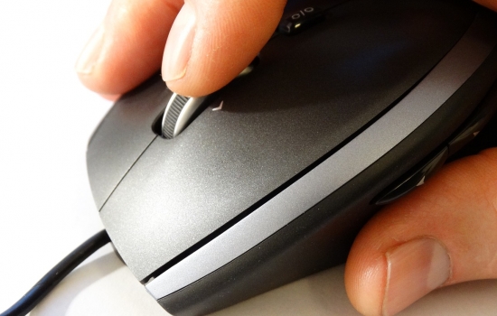 Hand on a computer mouse