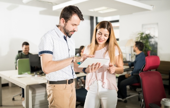 coworkers with tablet