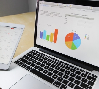 Latpop with graphs and charts on screen