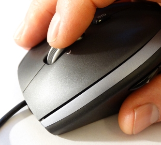 Hand on a computer mouse