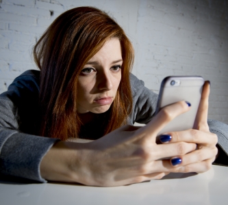 Woman looking at smart phone