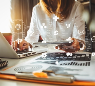 woman at desk with laptop