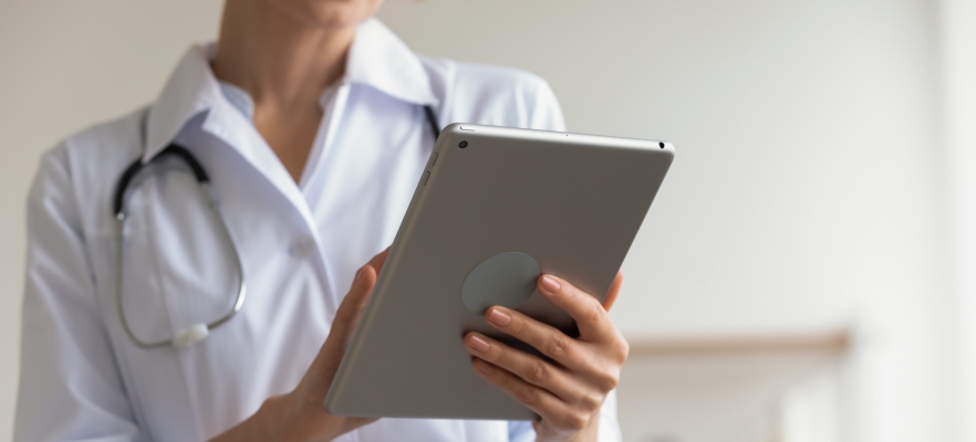 nurse with ipad