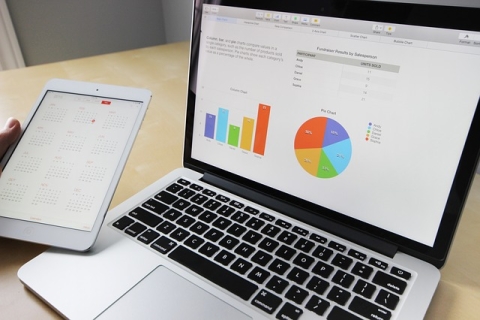 Latpop with graphs and charts on screen