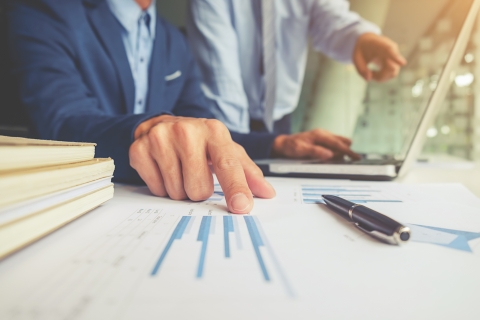 Business owner checking numbers