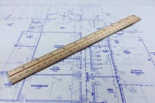 Blueprint with ruler on top of it