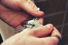 Hands holding keys