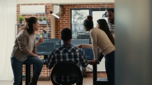 workers around desk